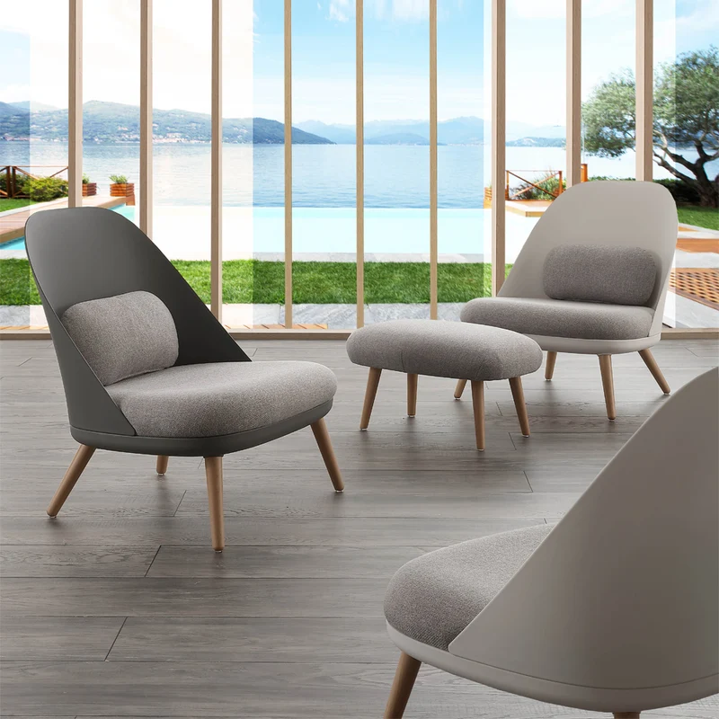 Poltrona design imbottita struttura in polipropilene e legno cm 70x66x75h - vari colori