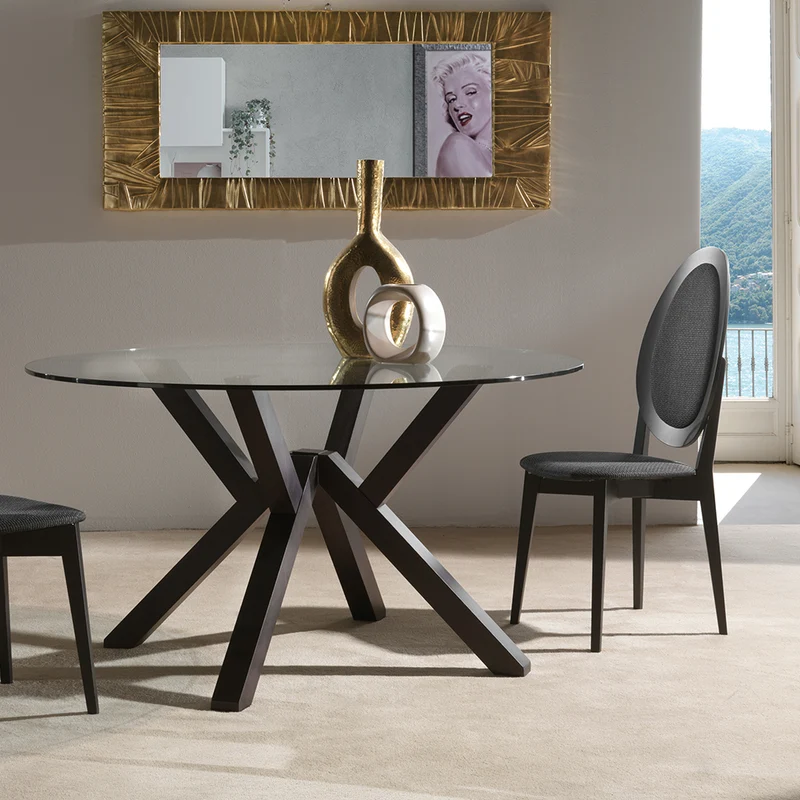 Teorema - Tavolo design tondo fisso con piano in vetro e gambe in massello cm 140x76h - vari colori